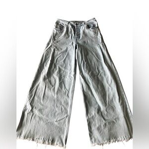 Wide legged light wash denim jeans